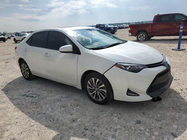 Photo 3 VIN: 5YFBURHE8KP877085 - TOYOTA COROLLA L 