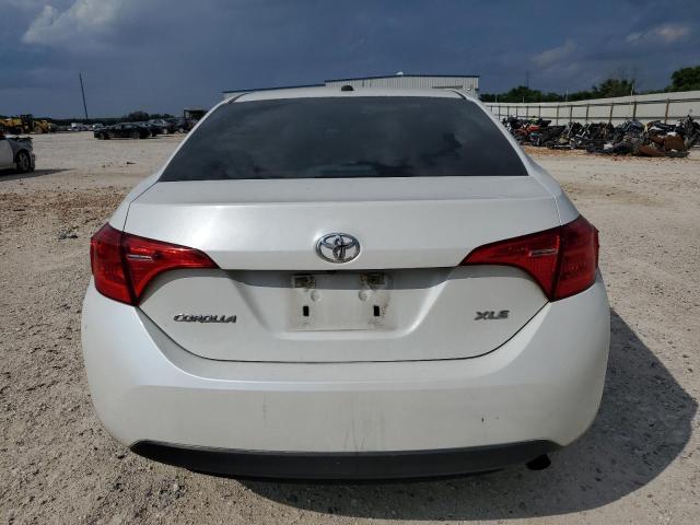 Photo 5 VIN: 5YFBURHE8KP877085 - TOYOTA COROLLA L 