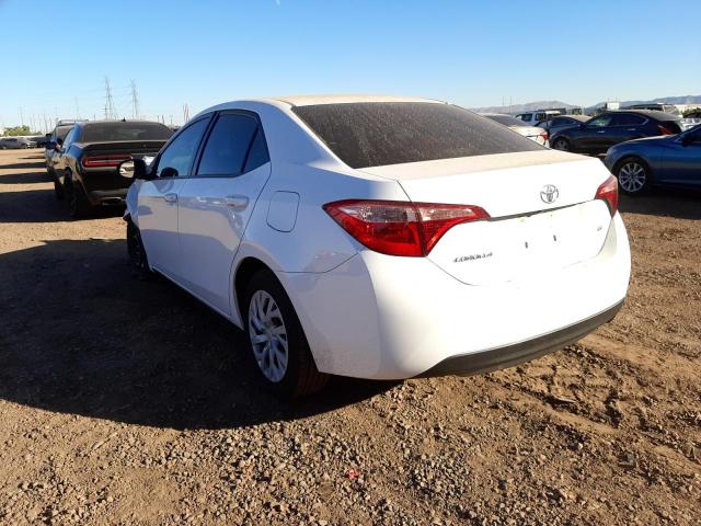 Photo 2 VIN: 5YFBURHE8KP877586 - TOYOTA COROLLA L 