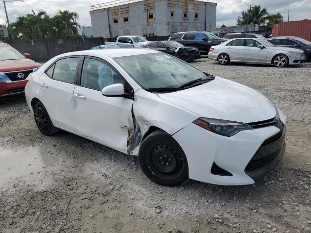 Photo 3 VIN: 5YFBURHE8KP878947 - TOYOTA COROLLA L 