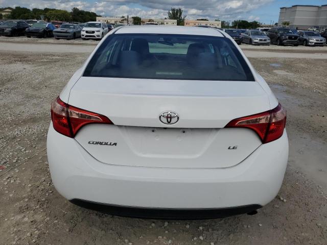 Photo 5 VIN: 5YFBURHE8KP878947 - TOYOTA COROLLA L 