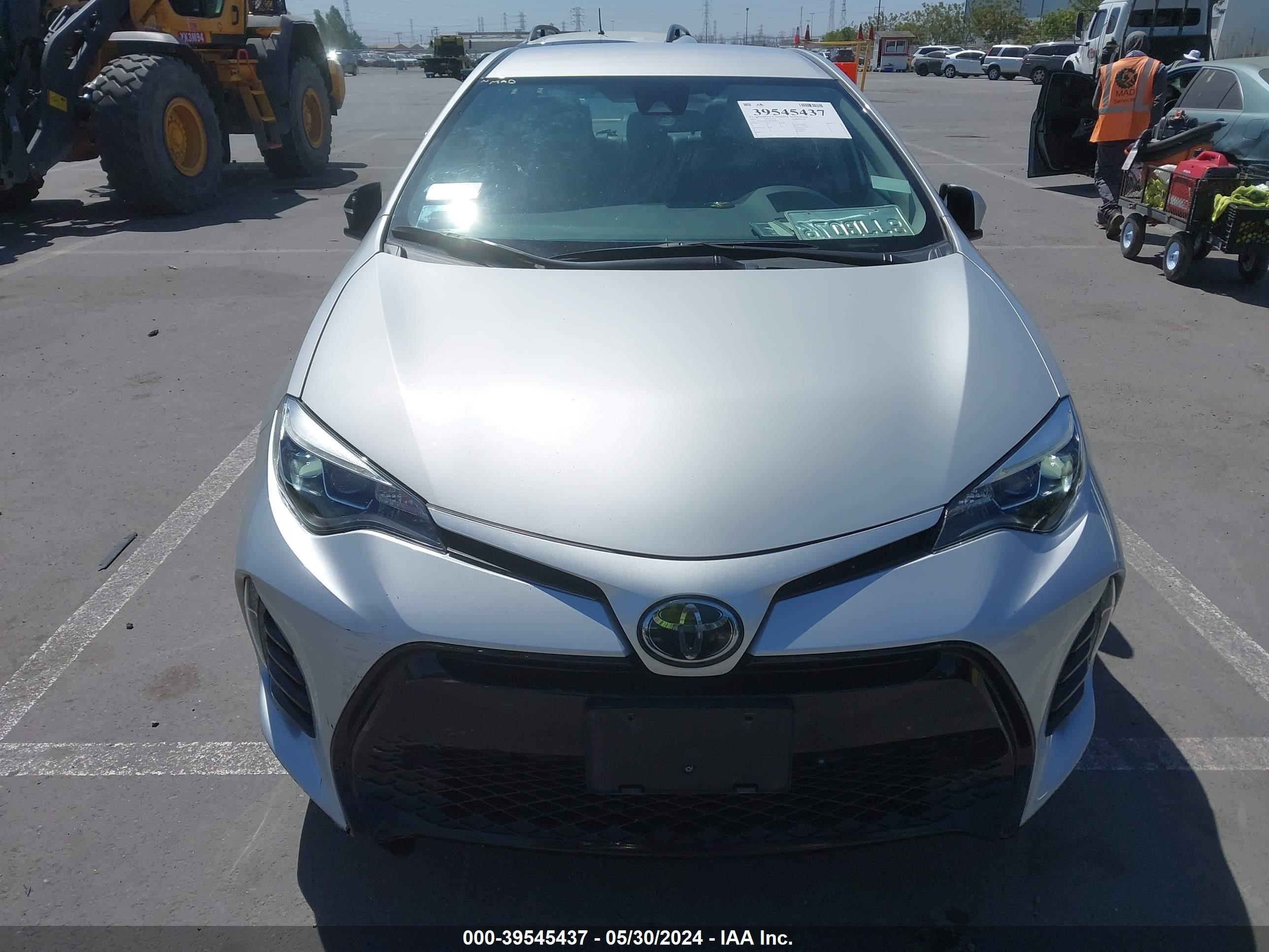 Photo 11 VIN: 5YFBURHE8KP882089 - TOYOTA COROLLA 