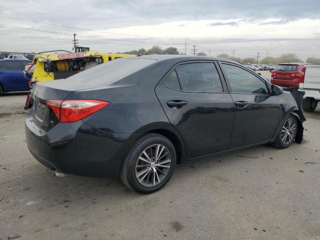 Photo 2 VIN: 5YFBURHE8KP884151 - TOYOTA COROLLA L 