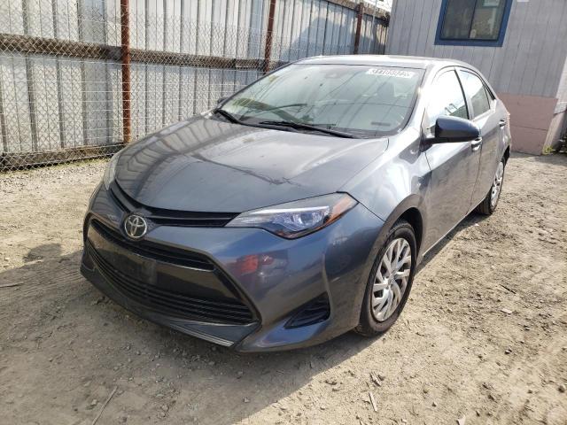 Photo 1 VIN: 5YFBURHE8KP885722 - TOYOTA COROLLA L 