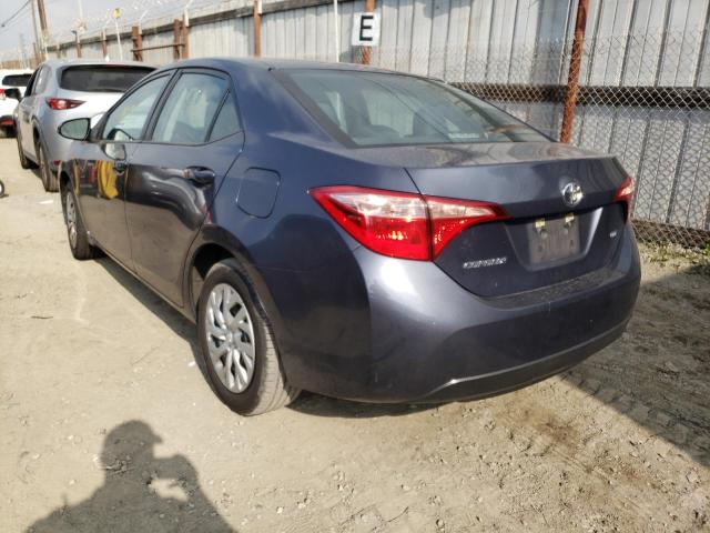 Photo 2 VIN: 5YFBURHE8KP885722 - TOYOTA COROLLA L 