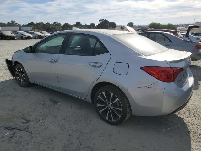 Photo 1 VIN: 5YFBURHE8KP885784 - TOYOTA COROLLA L 