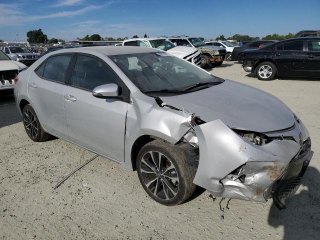 Photo 3 VIN: 5YFBURHE8KP885784 - TOYOTA COROLLA L 