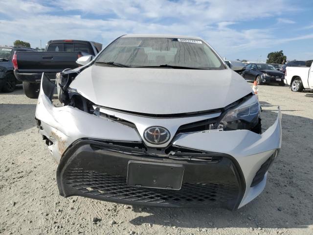 Photo 4 VIN: 5YFBURHE8KP885784 - TOYOTA COROLLA L 