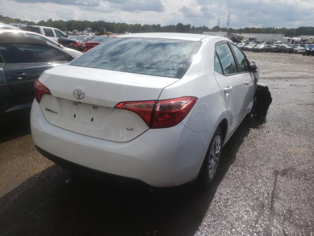 Photo 3 VIN: 5YFBURHE8KP888815 - TOYOTA COROLLA L 