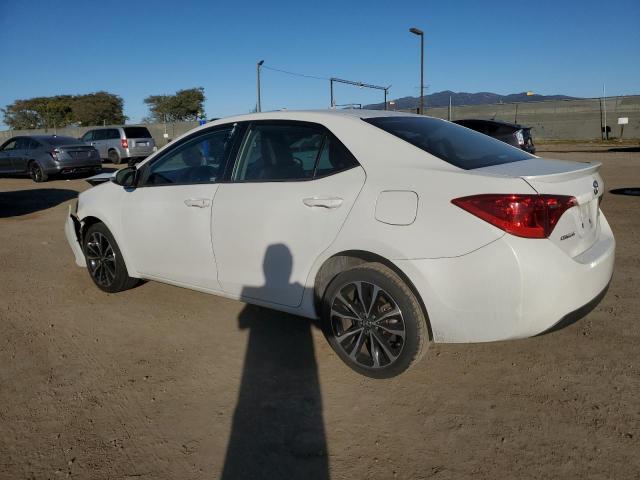 Photo 1 VIN: 5YFBURHE8KP892783 - TOYOTA COROLLA L 