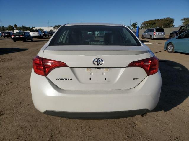 Photo 5 VIN: 5YFBURHE8KP892783 - TOYOTA COROLLA L 