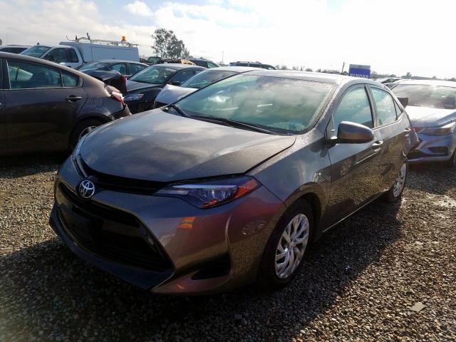 Photo 1 VIN: 5YFBURHE8KP899961 - TOYOTA COROLLA L 