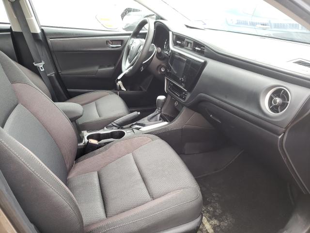 Photo 4 VIN: 5YFBURHE8KP900025 - TOYOTA COROLLA L 