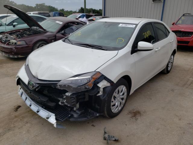 Photo 1 VIN: 5YFBURHE8KP900638 - TOYOTA COROLLA L 