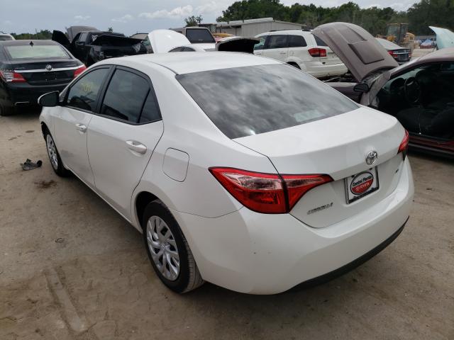 Photo 2 VIN: 5YFBURHE8KP900638 - TOYOTA COROLLA L 