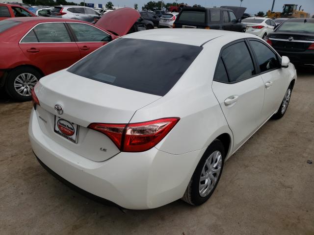 Photo 3 VIN: 5YFBURHE8KP900638 - TOYOTA COROLLA L 