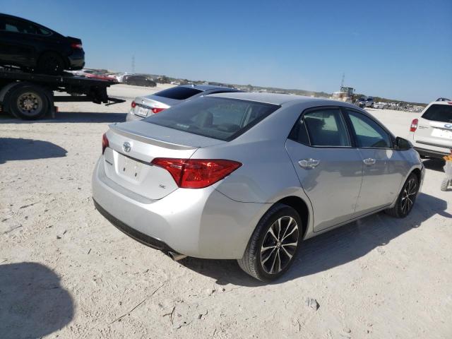 Photo 3 VIN: 5YFBURHE8KP902986 - TOYOTA COROLLA L 