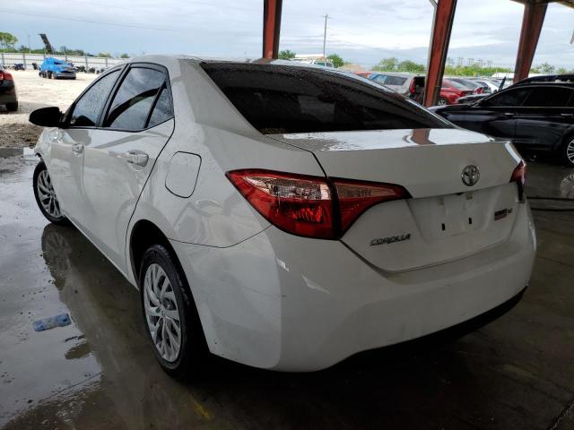 Photo 2 VIN: 5YFBURHE8KP913082 - TOYOTA COROLLA L 