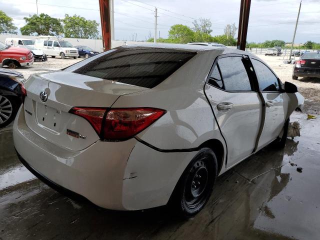 Photo 3 VIN: 5YFBURHE8KP913082 - TOYOTA COROLLA L 