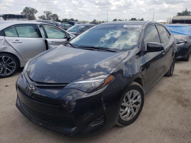 Photo 8 VIN: 5YFBURHE8KP918587 - TOYOTA COROLLA L 