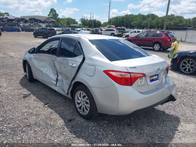 Photo 2 VIN: 5YFBURHE8KP945756 - TOYOTA COROLLA 