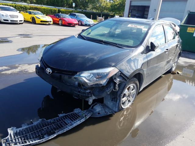 Photo 1 VIN: 5YFBURHE9EP076444 - TOYOTA COROLLA L 