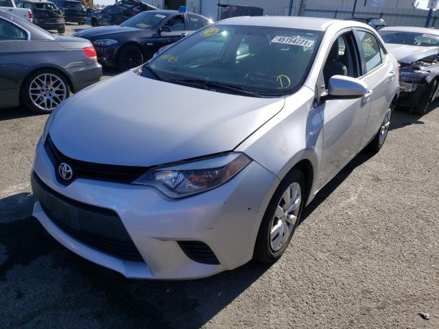 Photo 1 VIN: 5YFBURHE9EP084138 - TOYOTA COROLLA L 