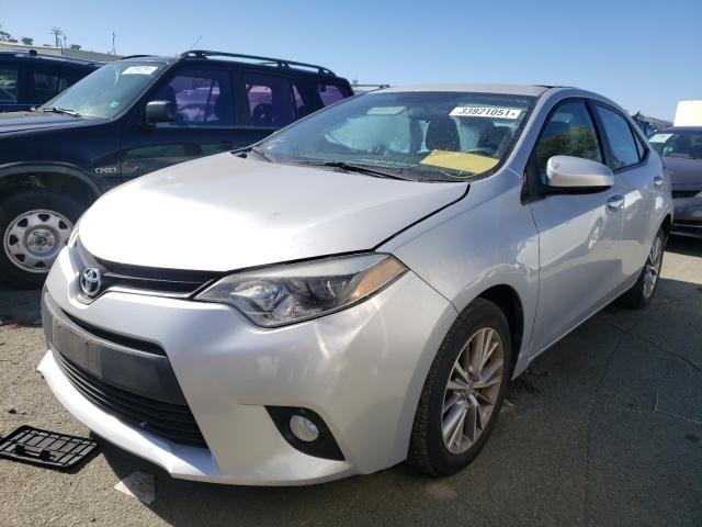 Photo 1 VIN: 5YFBURHE9EP084866 - TOYOTA COROLLA L 