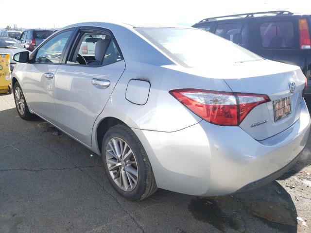 Photo 2 VIN: 5YFBURHE9EP084866 - TOYOTA COROLLA L 