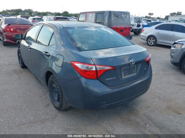 Photo 2 VIN: 5YFBURHE9EP090957 - TOYOTA COROLLA 