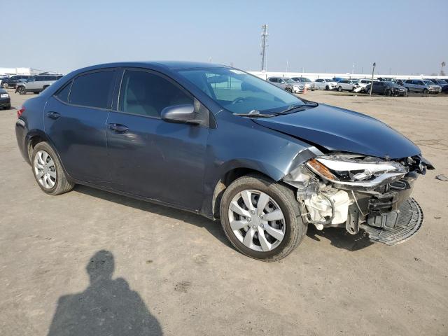 Photo 3 VIN: 5YFBURHE9EP091414 - TOYOTA COROLLA L 