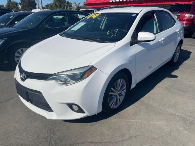 Photo 1 VIN: 5YFBURHE9EP105568 - TOYOTA COROLLA 