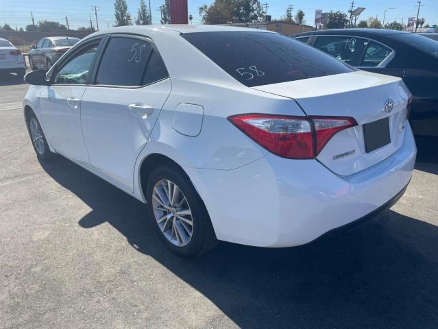 Photo 2 VIN: 5YFBURHE9EP105568 - TOYOTA COROLLA 