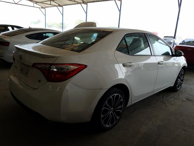 Photo 3 VIN: 5YFBURHE9EP126470 - TOYOTA COROLLA L 