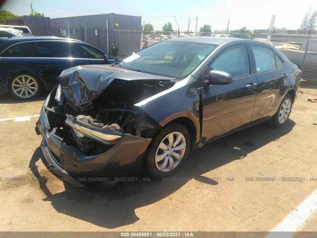 Photo 1 VIN: 5YFBURHE9EP142829 - TOYOTA COROLLA 