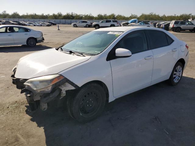 Photo 4 VIN: 5YFBURHE9FP317372 - TOYOTA COROLLA L 