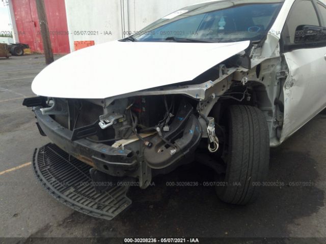 Photo 5 VIN: 5YFBURHE9FP335399 - TOYOTA COROLLA 