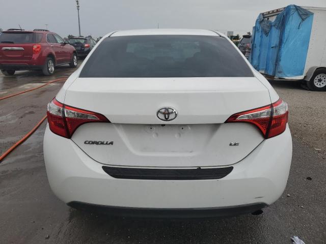 Photo 5 VIN: 5YFBURHE9GP379033 - TOYOTA COROLLA L 