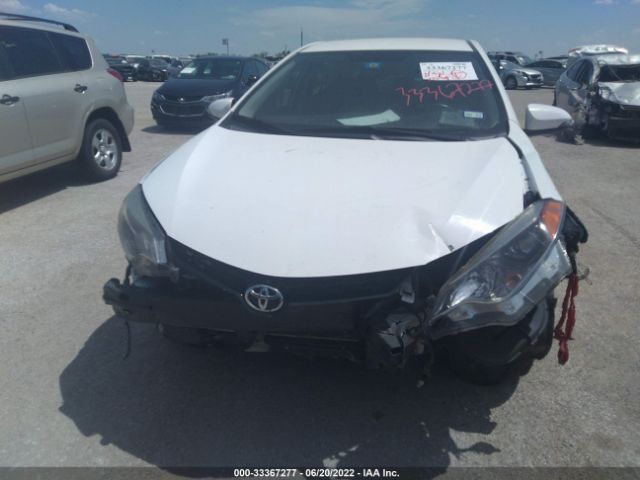 Photo 5 VIN: 5YFBURHE9GP390243 - TOYOTA COROLLA 