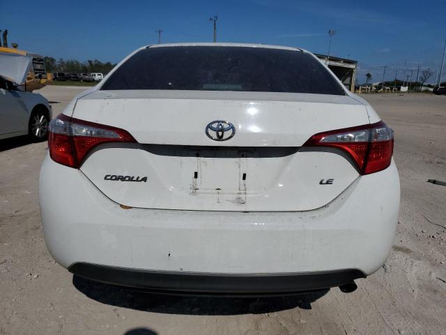 Photo 5 VIN: 5YFBURHE9GP512082 - TOYOTA COROLLA L 