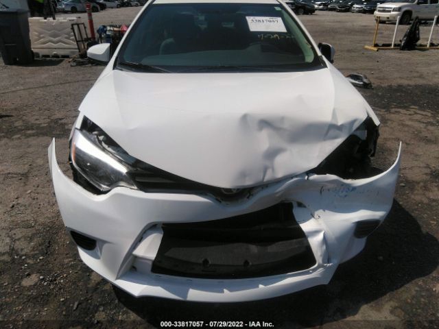 Photo 5 VIN: 5YFBURHE9GP555207 - TOYOTA COROLLA 