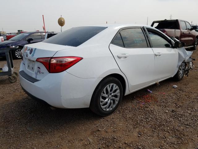 Photo 3 VIN: 5YFBURHE9HP602303 - TOYOTA COROLLA L 