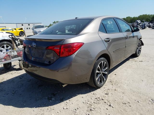 Photo 3 VIN: 5YFBURHE9HP665532 - TOYOTA COROLLA L 