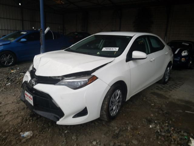 Photo 1 VIN: 5YFBURHE9HP669578 - TOYOTA COROLLA L 