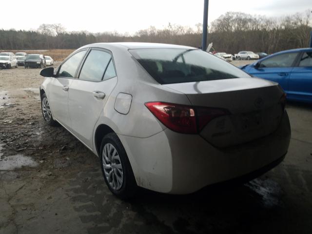 Photo 2 VIN: 5YFBURHE9HP669578 - TOYOTA COROLLA L 