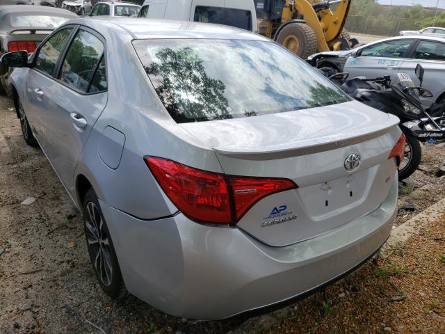 Photo 2 VIN: 5YFBURHE9HP670567 - TOYOTA COROLLA L 