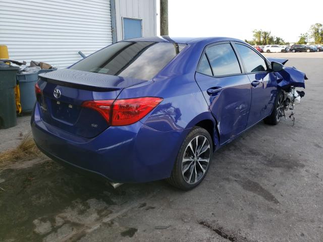 Photo 3 VIN: 5YFBURHE9HP677065 - TOYOTA COROLLA L 