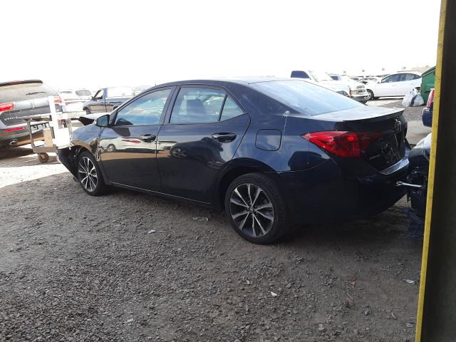 Photo 2 VIN: 5YFBURHE9HP690513 - TOYOTA COROLLA L 