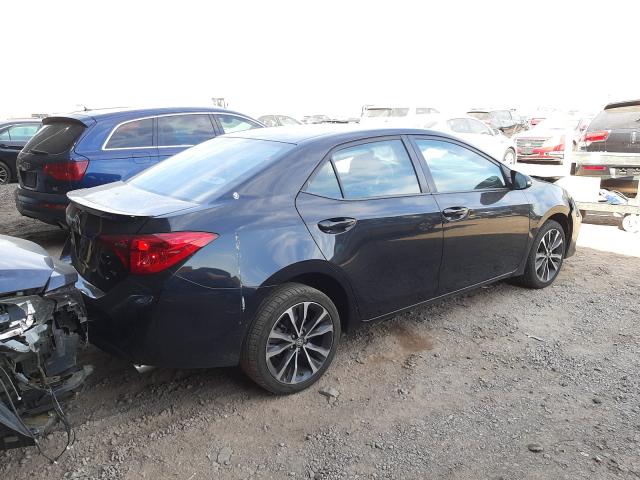 Photo 3 VIN: 5YFBURHE9HP690513 - TOYOTA COROLLA L 