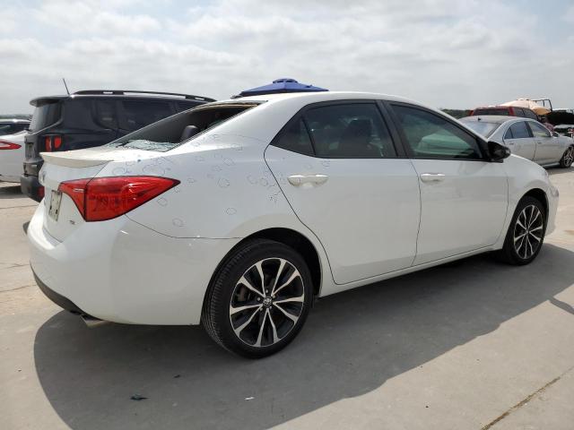 Photo 2 VIN: 5YFBURHE9HP692133 - TOYOTA COROLLA L 